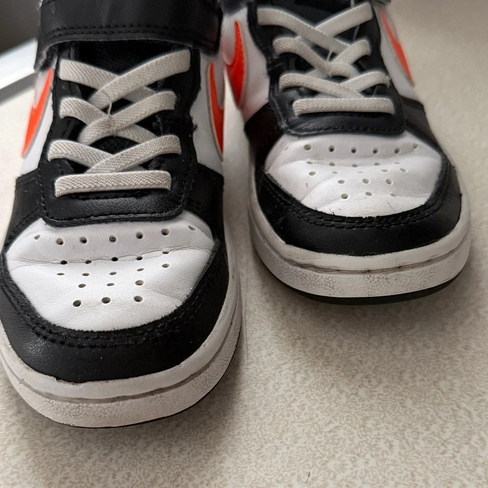 Nike Kids' Sneakers in Black, White, and Orange